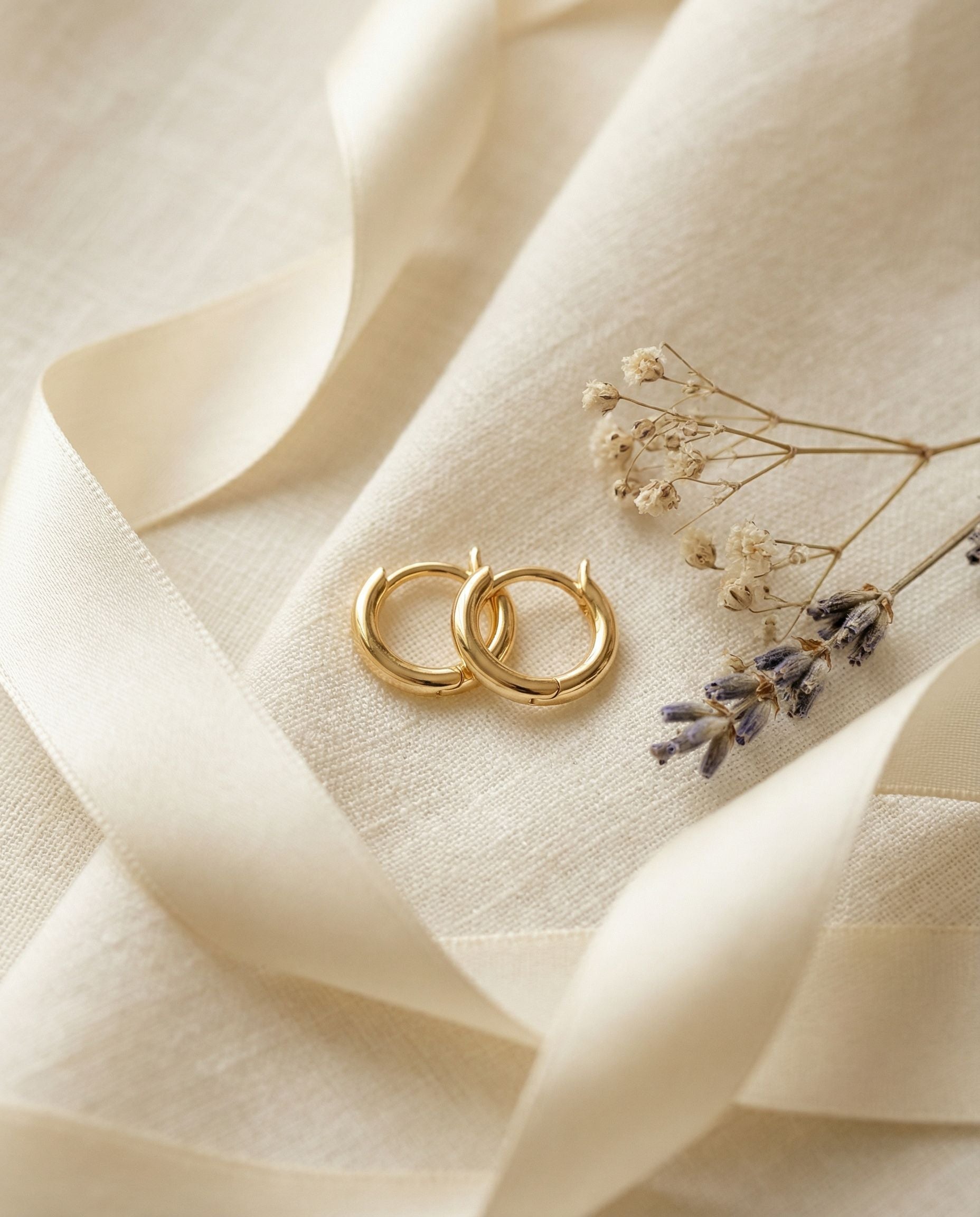 Lucia Gold Huggie Earrings