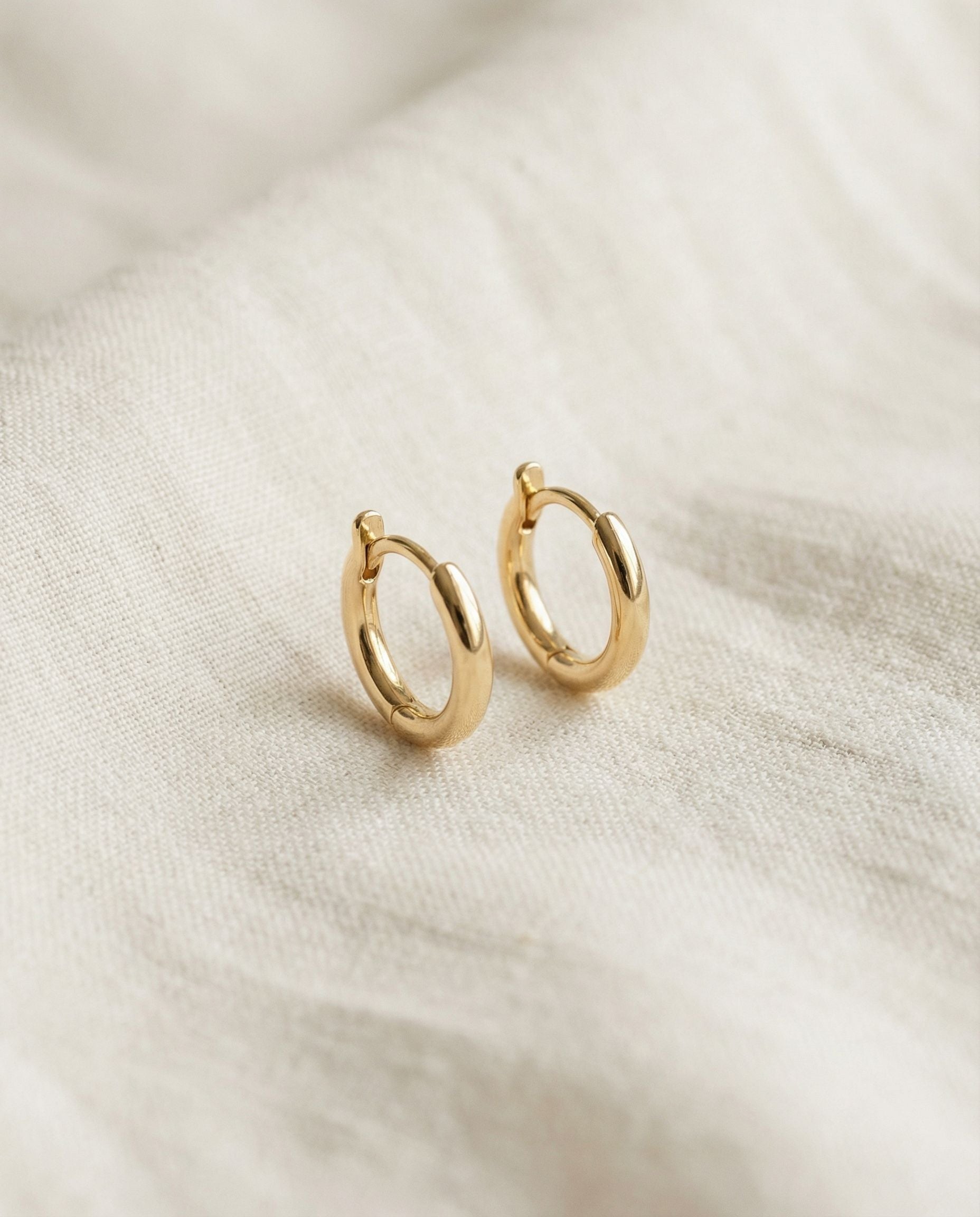 Lucia Gold Huggie Earrings