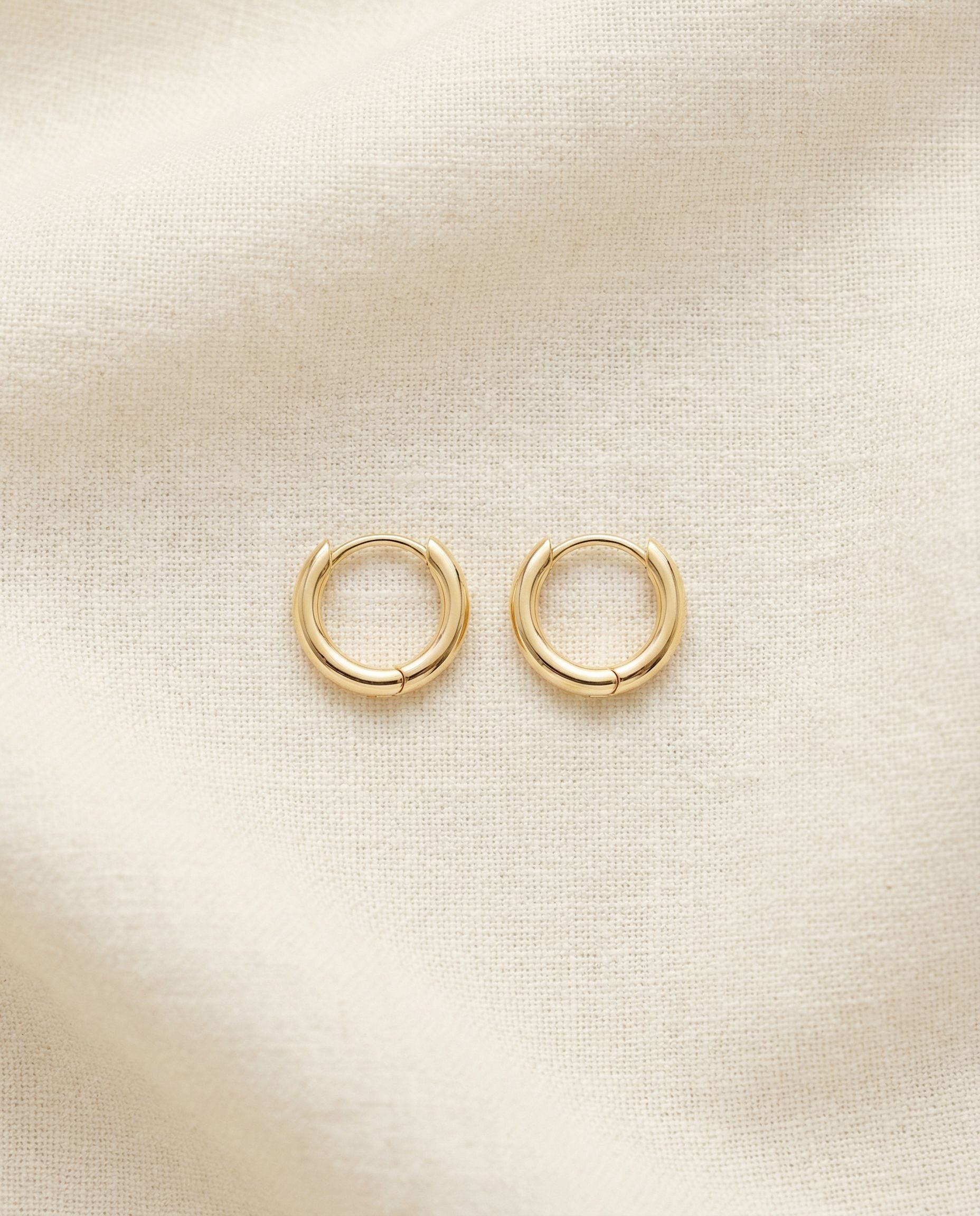 Lucia Gold Huggie Earrings
