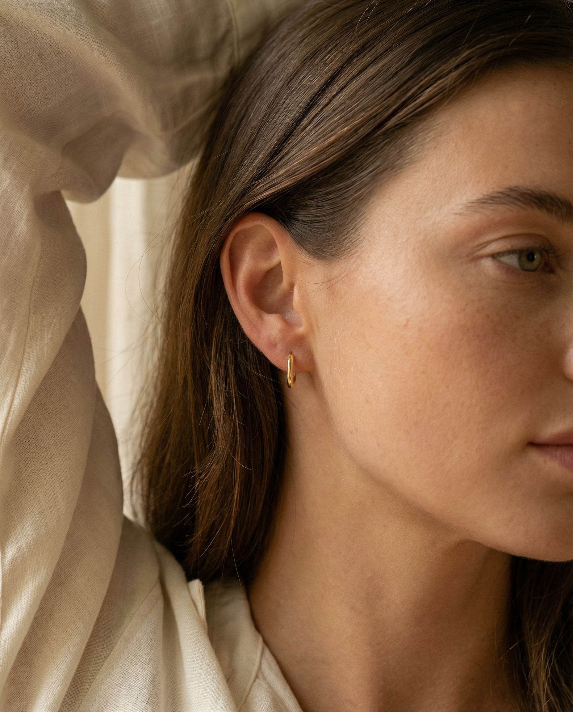 Lucia Gold Huggie Earrings