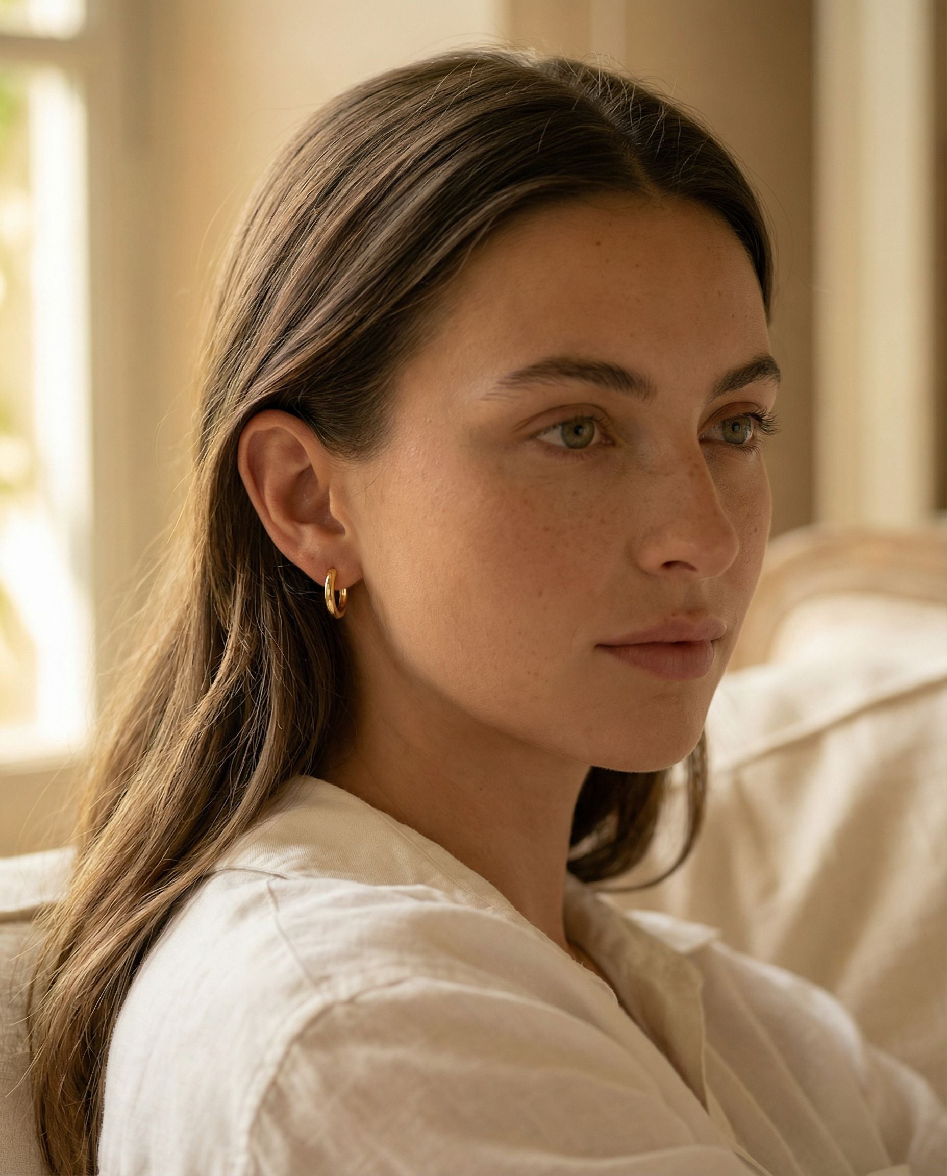 Lucia Gold Huggie Earrings